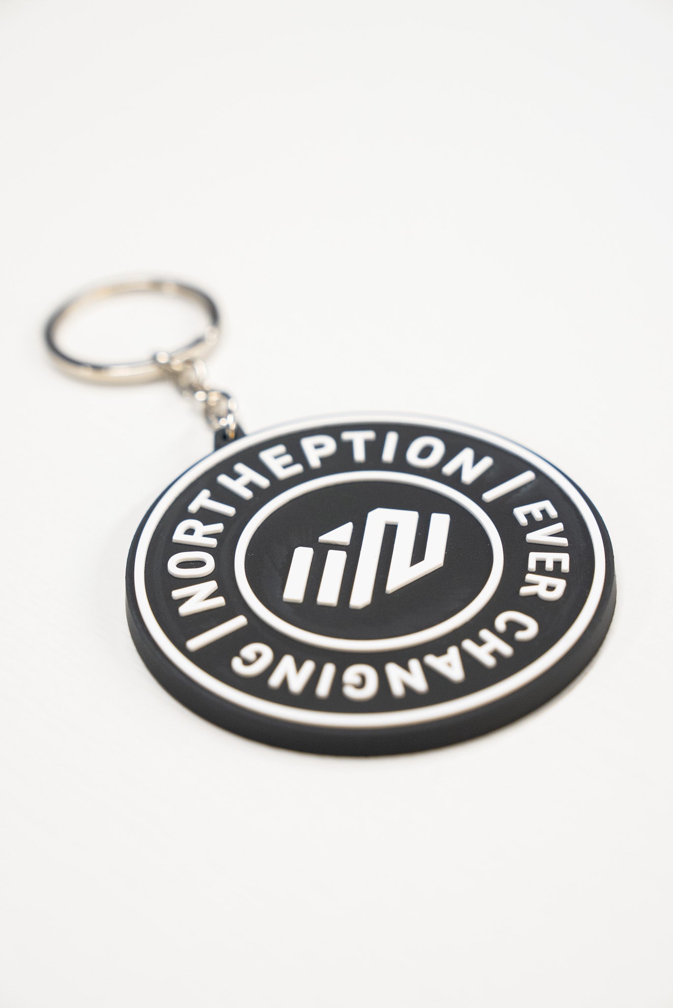 Circle logo rubber keychain